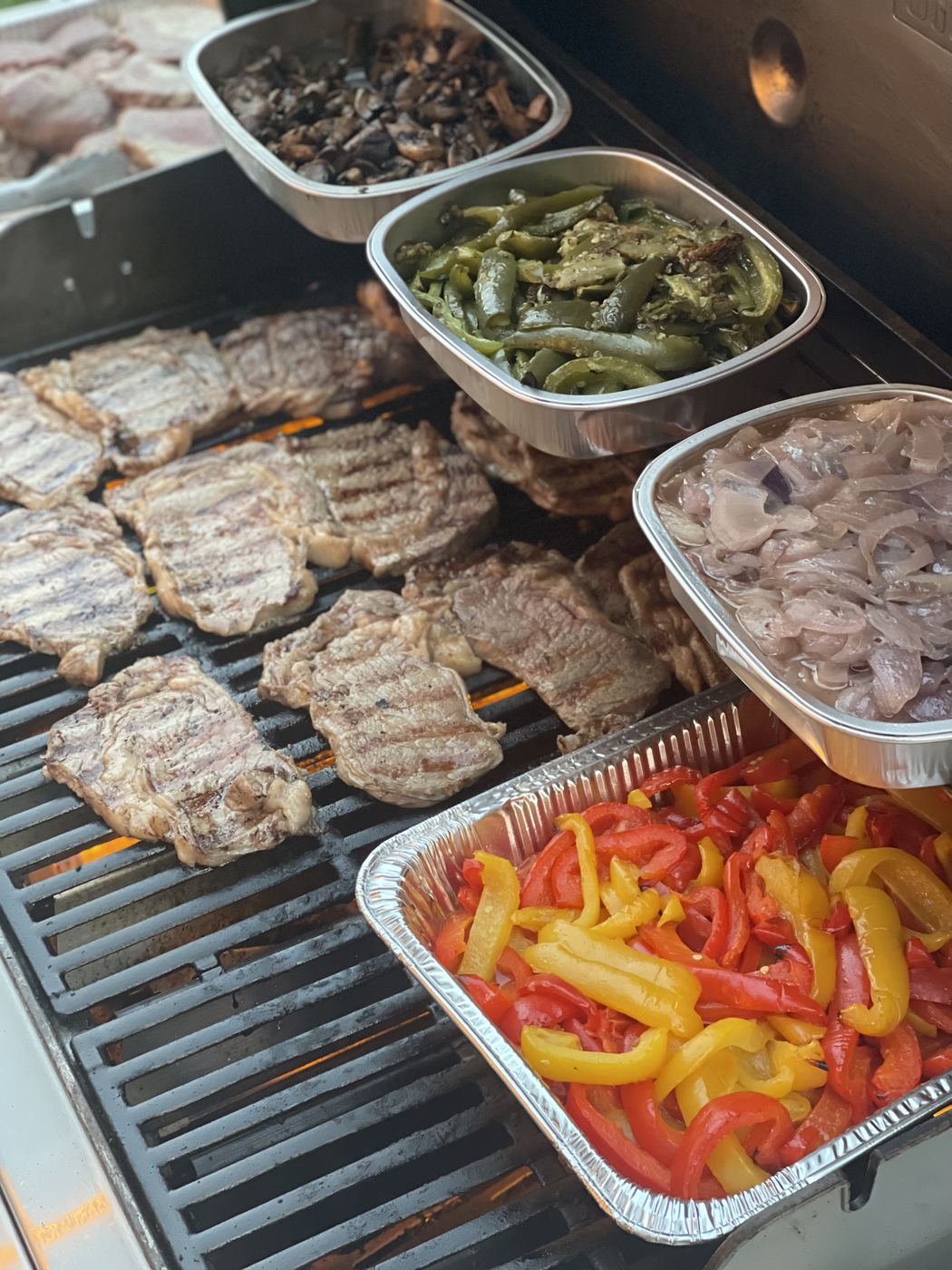 Custom catering trays hot off the grill from Pat's Prime Cuts
