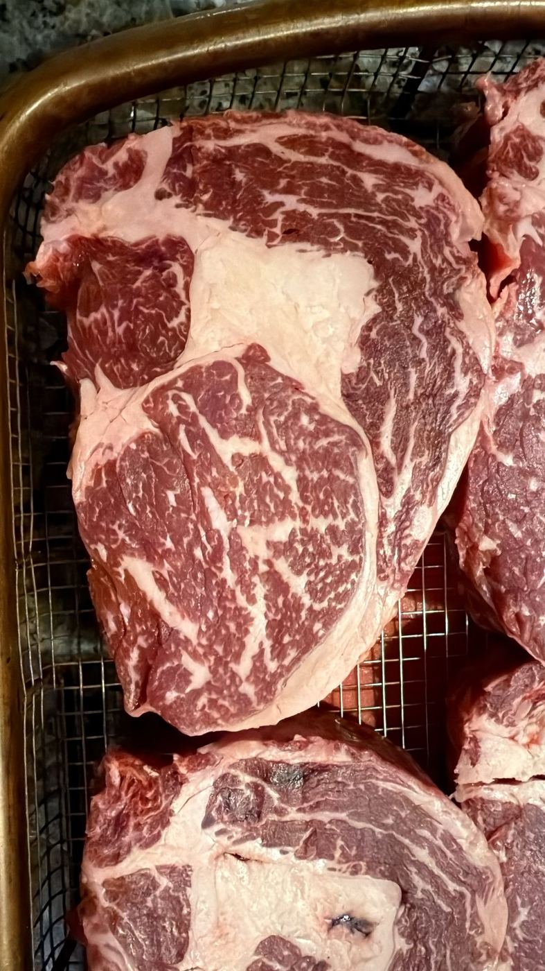 Fresh hand-cut marbled ribeye at Pat's Prime Cuts