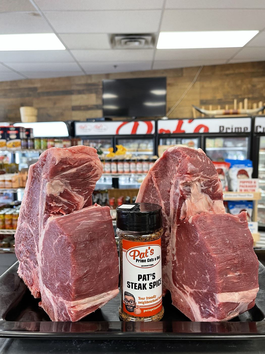Pat's own cuts and house steak spice on the counter in the Georgetown shop